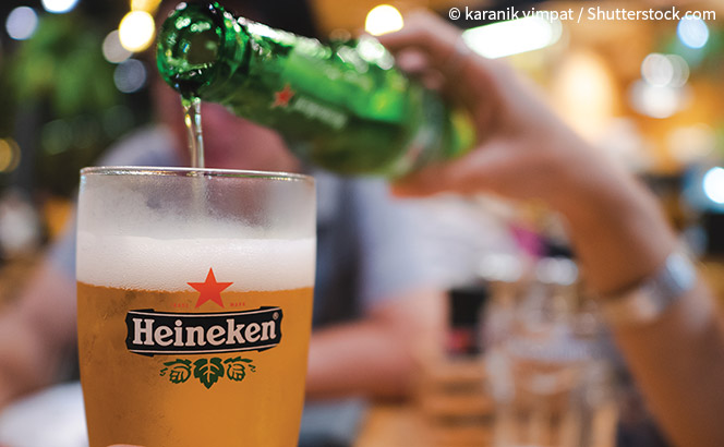 pouring a Heineken beer