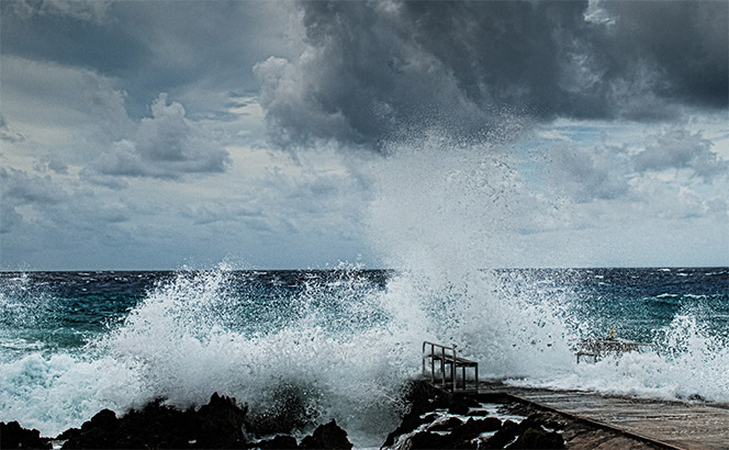 waves crashing on rocks